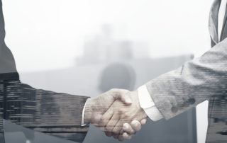 business partners shaking hands