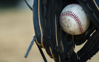 baseball in glove
