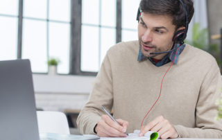 man with a heaphones having an online meeting