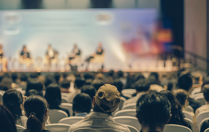 audience watching a presentation